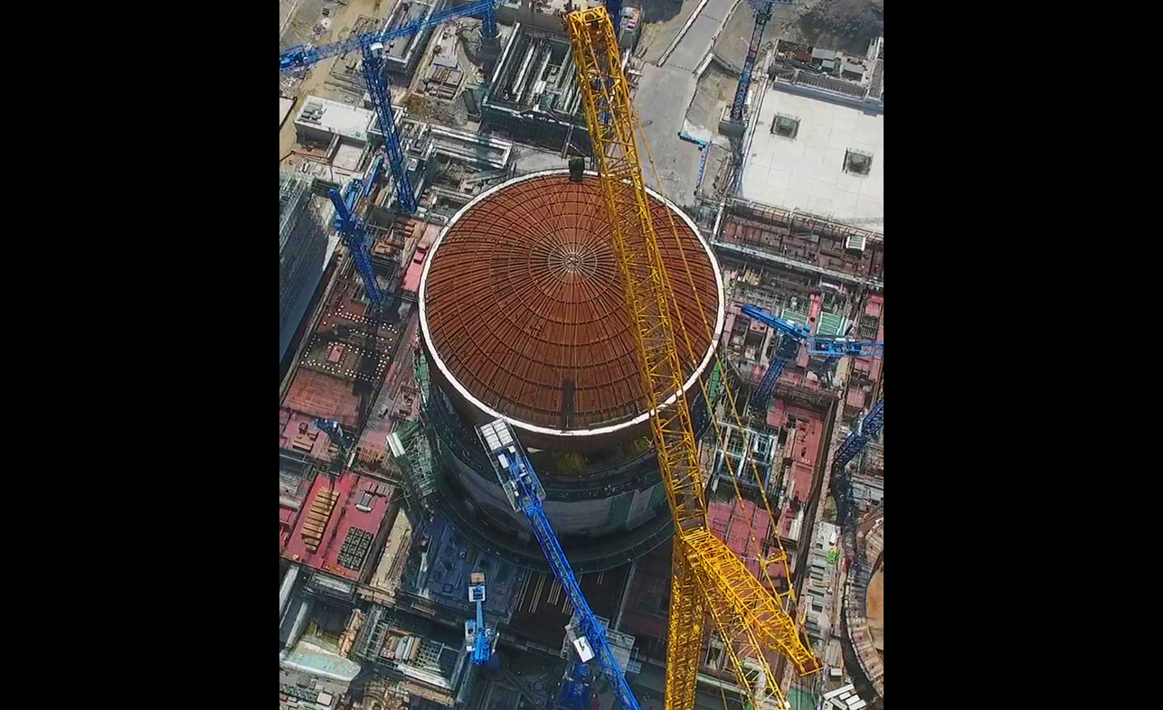 5月23日无人机拍摄的中广核防城港核电二期工程3号机组穹顶吊装施工现场。新华社发（广西防城港核电公司供图）